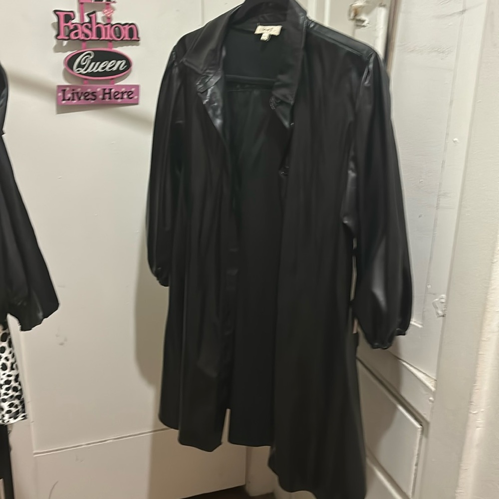 Black top can use as shirt or jacket.